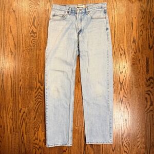 Vintage Levi's 550 Relaxed Fit Tapered Leg Jeans 33x34 Light Wash Blue Denim